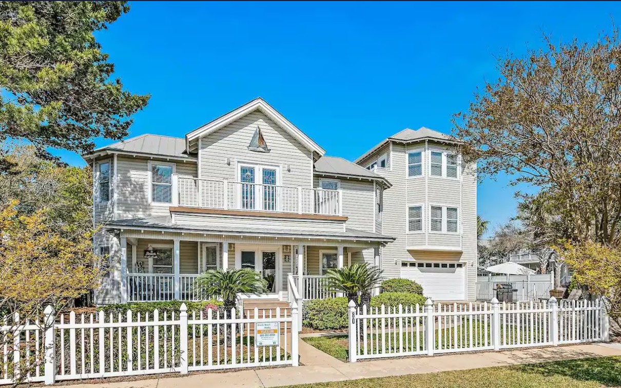 Luxury home exterior with private pool and rooftop deck