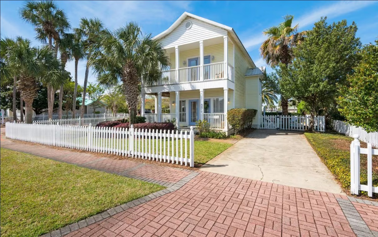 Charming beach cottage exterior with private pool and Gulf view